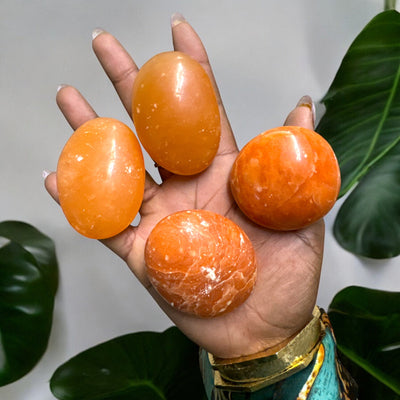 Orange Twist Calcite Palm Stone for Energy & Creativity